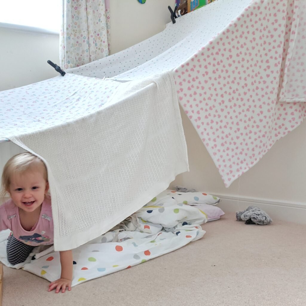 dramatic play den blanket fort